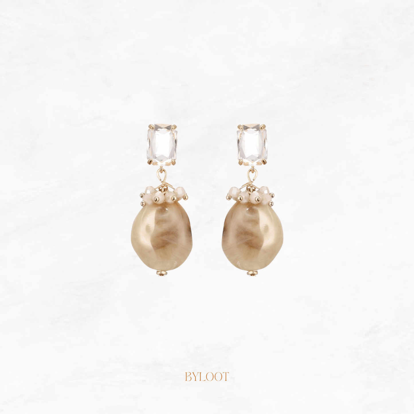 Beige fling statement earring