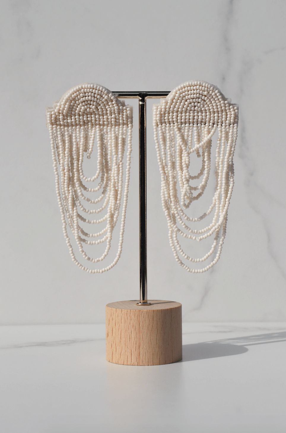 Less is more white statement earring