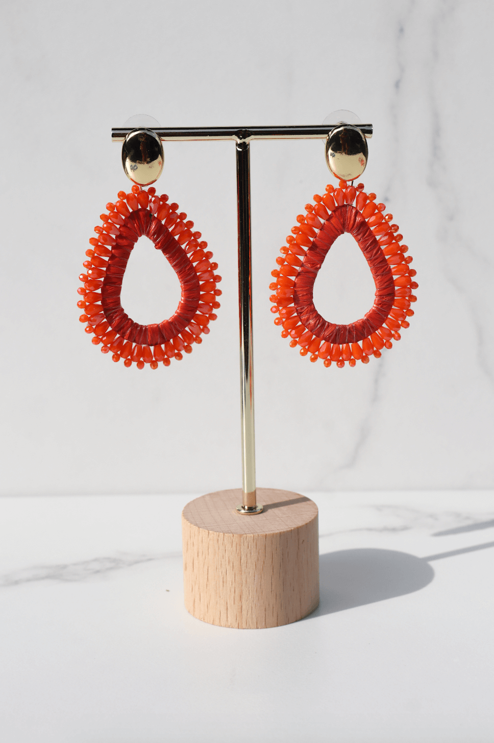 Samé orange statement earring