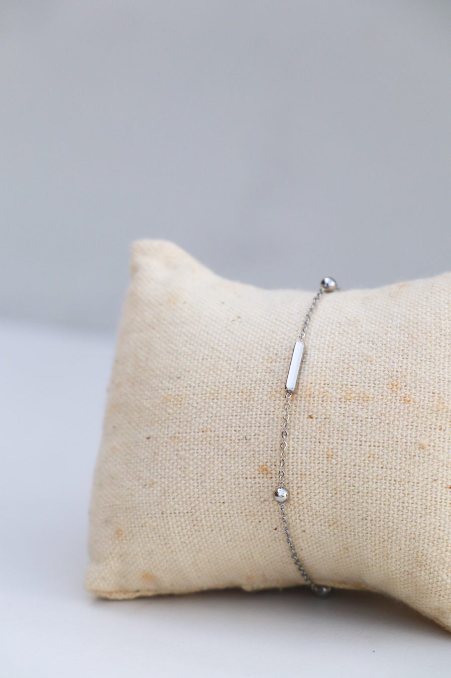Lady in silver bracelet