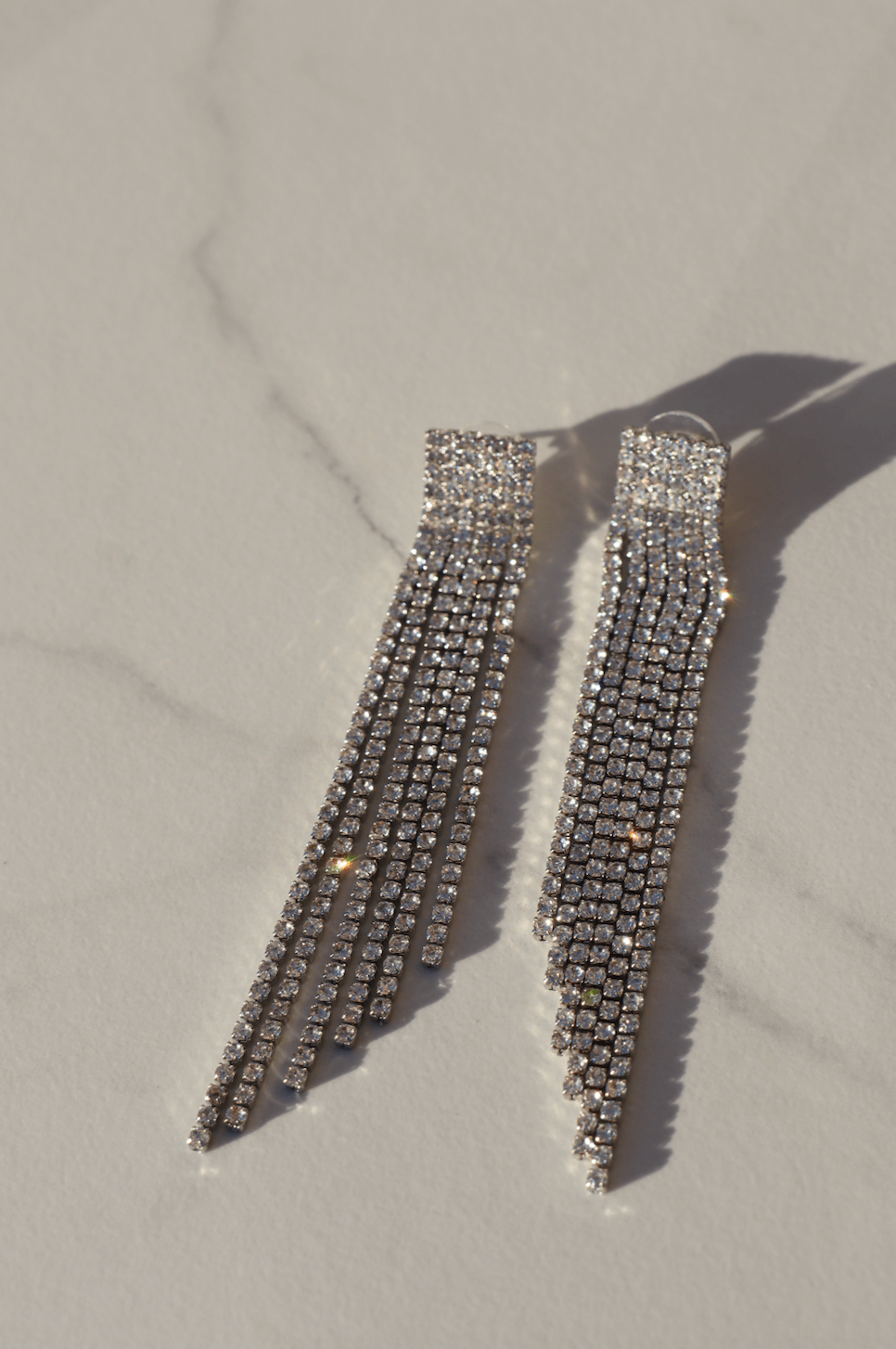 Swing silver statement earring