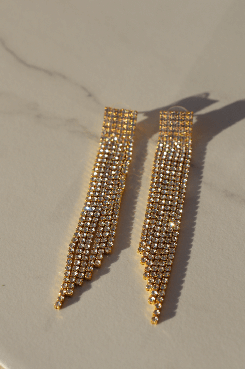 Swing gold statement earring