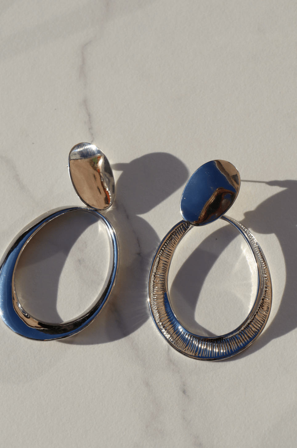 Big silver statement earring