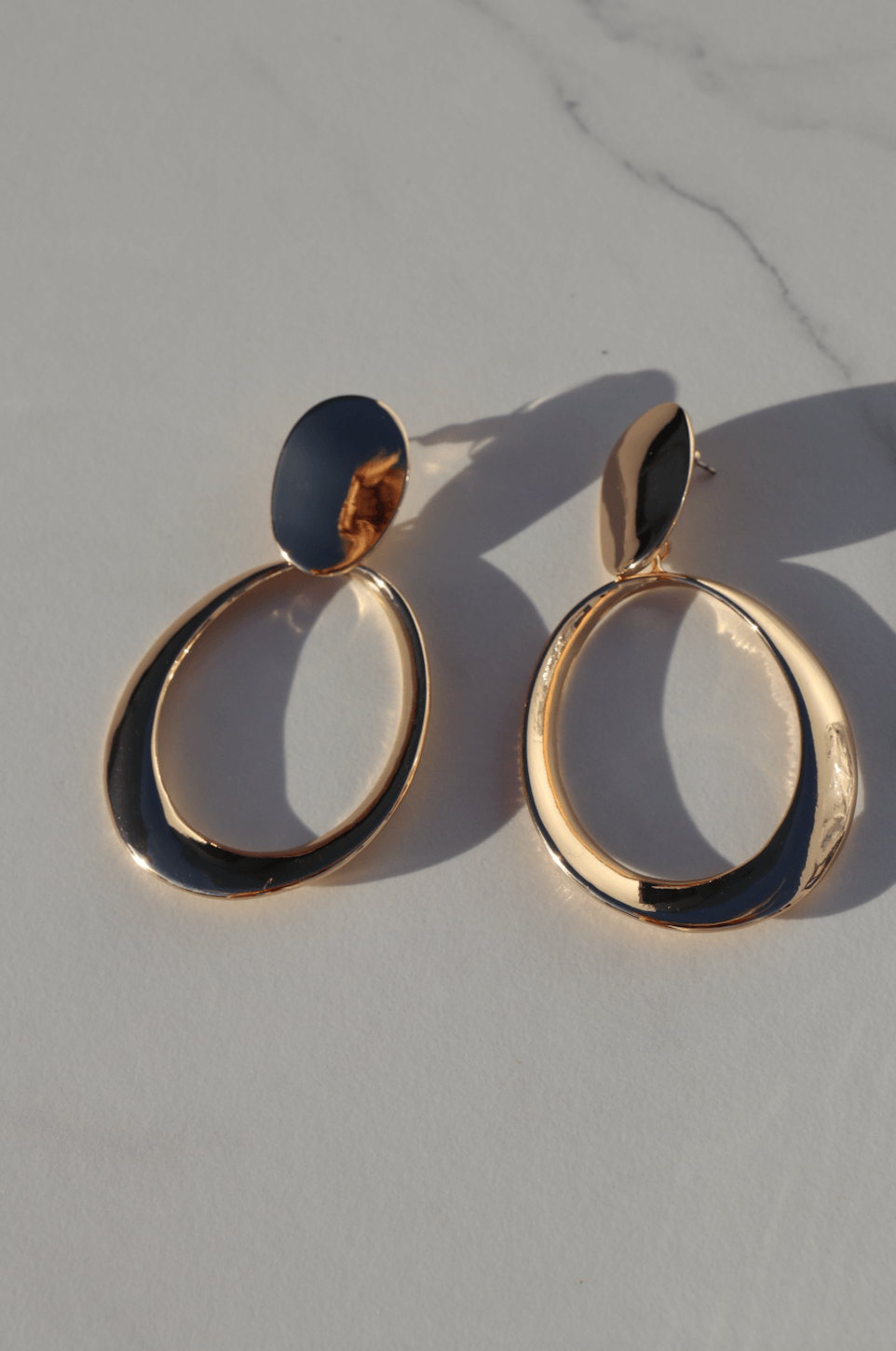 Big golden statement earring