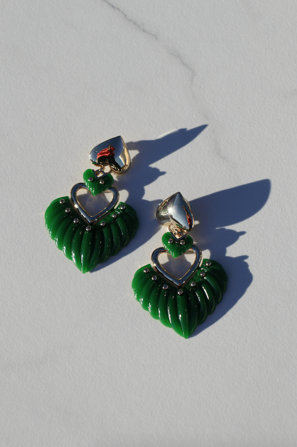 Green heart statement earring