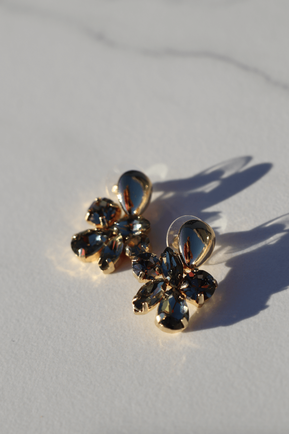Green flower statement earrings