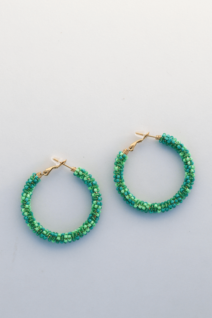 Green hoop statement earring
