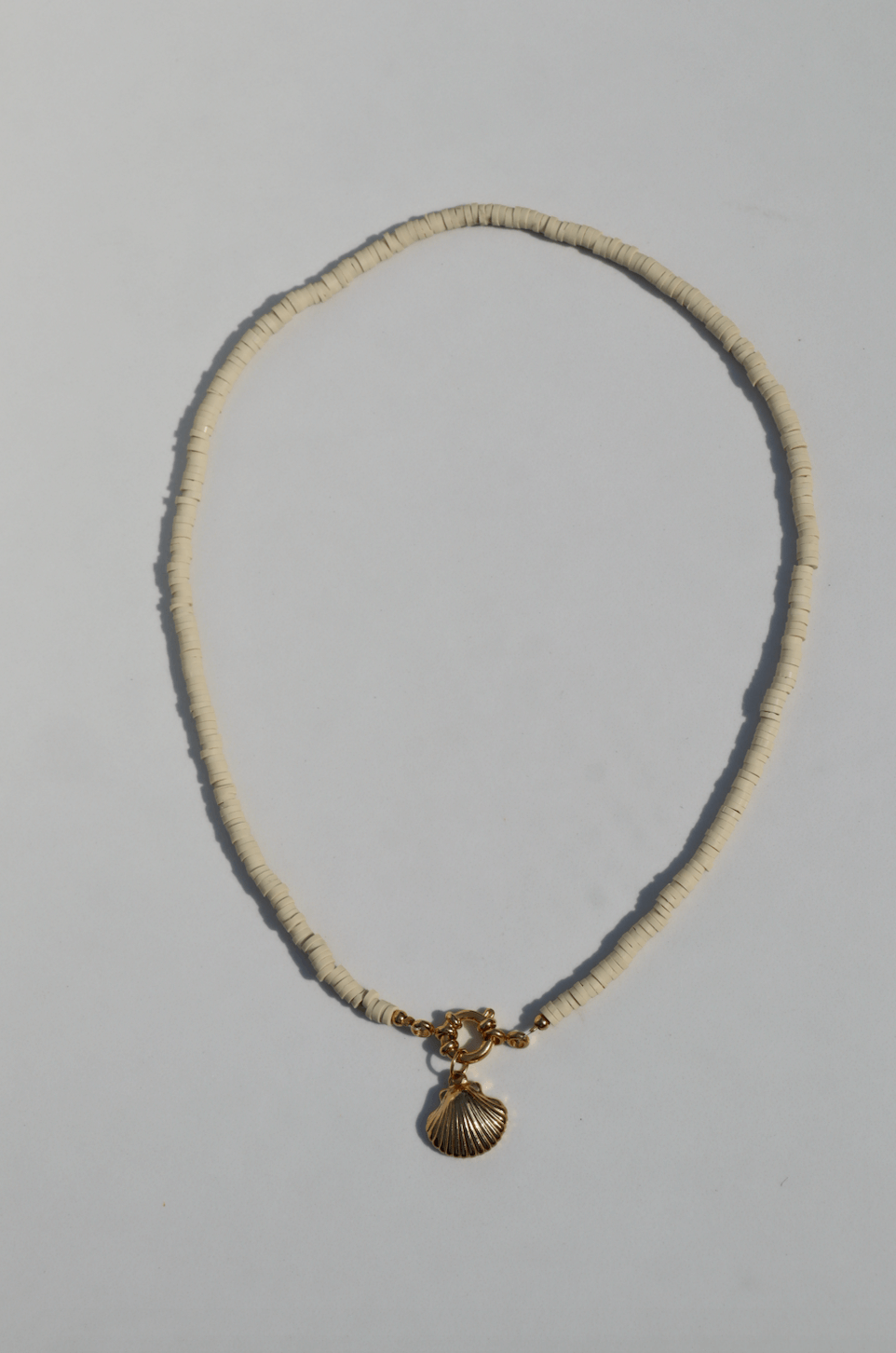 Surf necklace beige