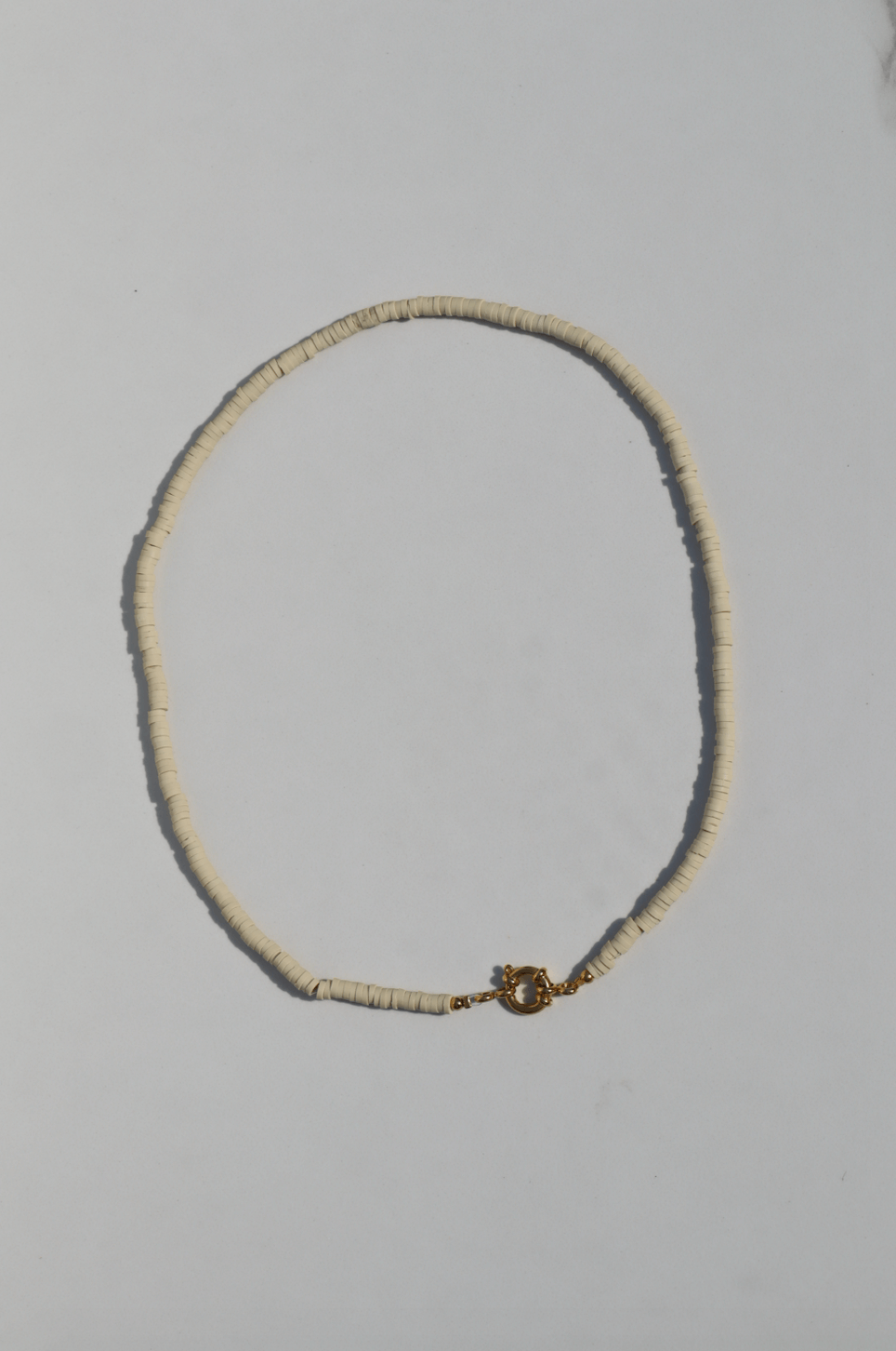Surf necklace beige