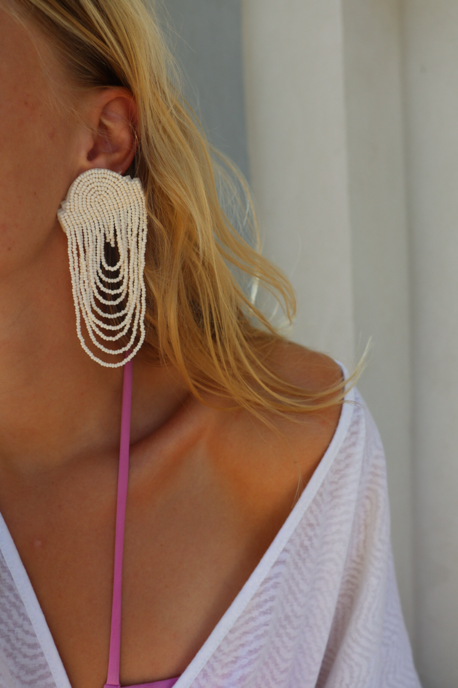 Less is more white statement earring
