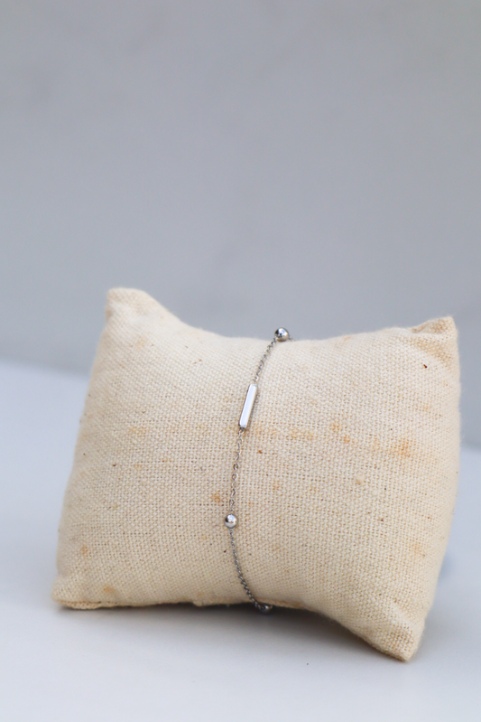 Lady in silver bracelet
