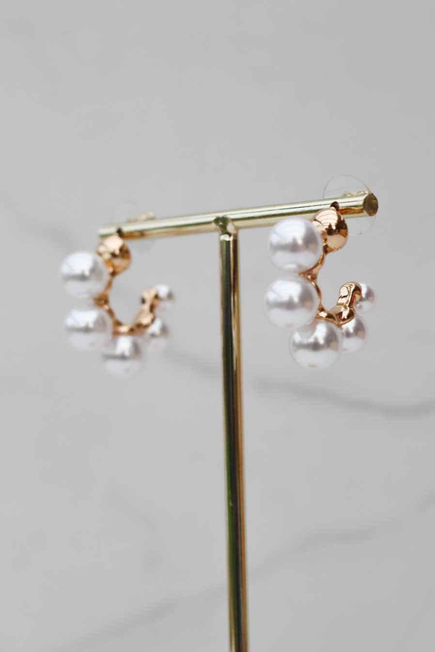 Pearl hoop statement earring