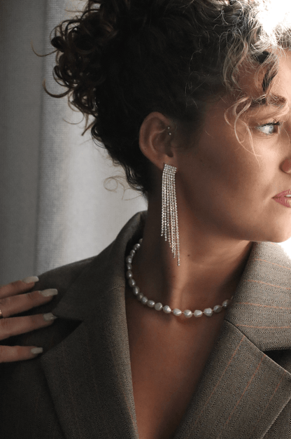 Swing gold statement earring