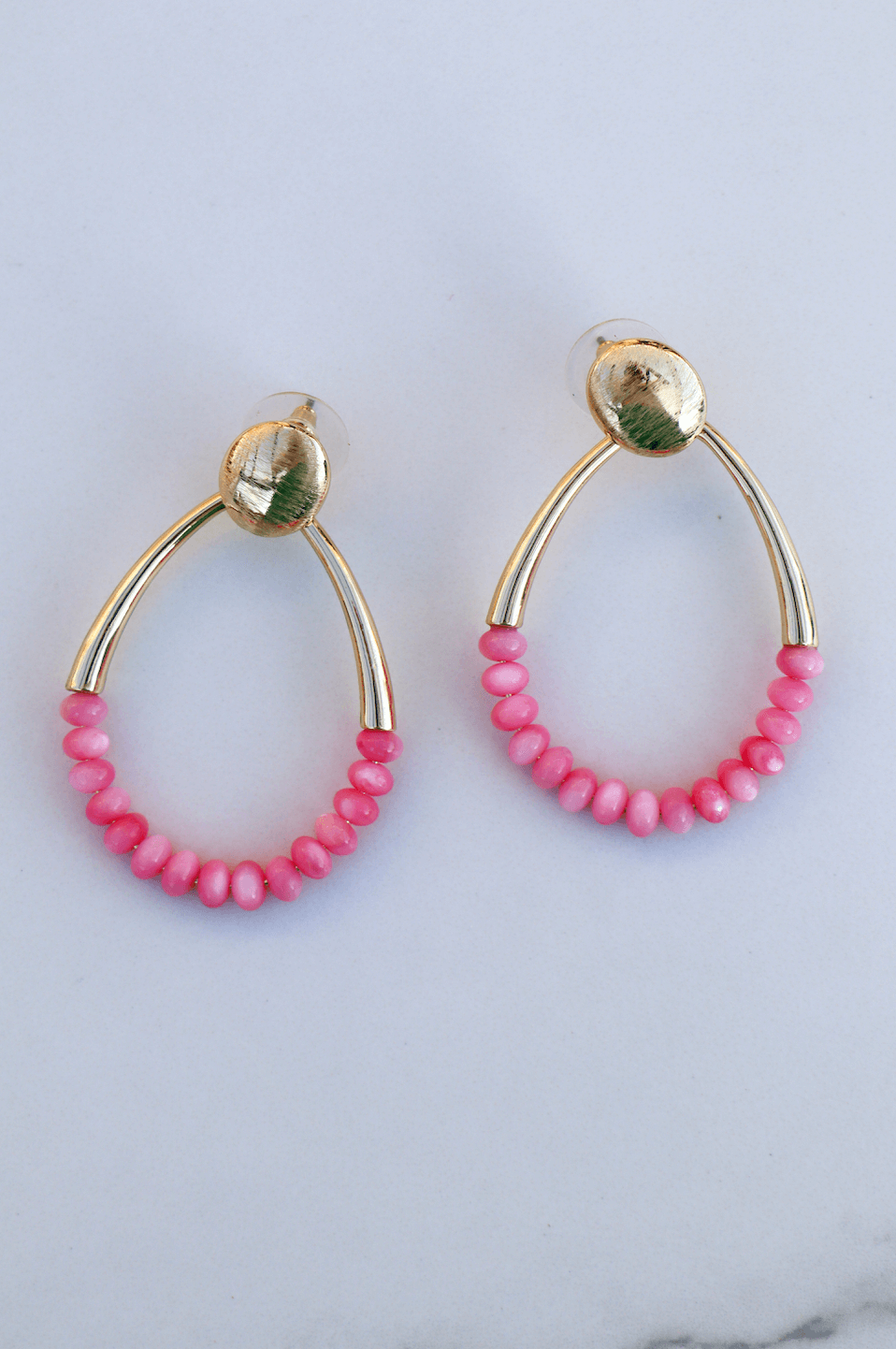 Sassy light pink statement earring